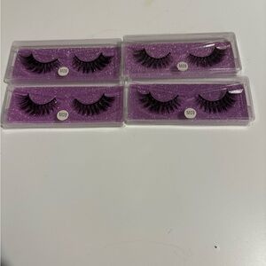 Set of False Eyelashes on Purple Glitter Background
